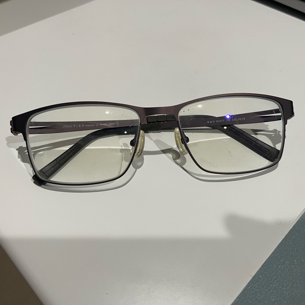 Ipoyo titanium frame glasses.